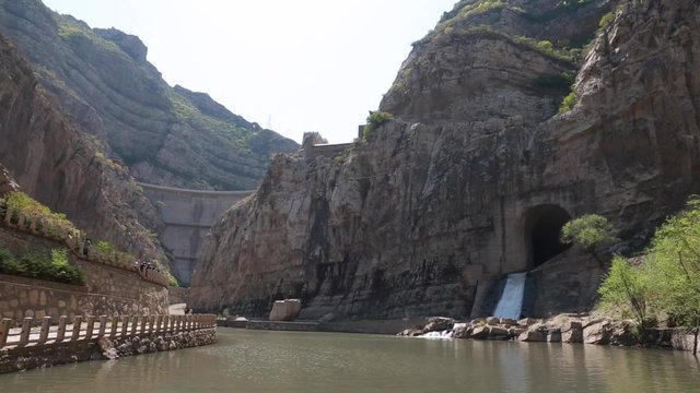 dam by the hanging temple in datong china with tourists