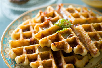 Gourmet breakfast and brunch setting with savory waffles, pancakes