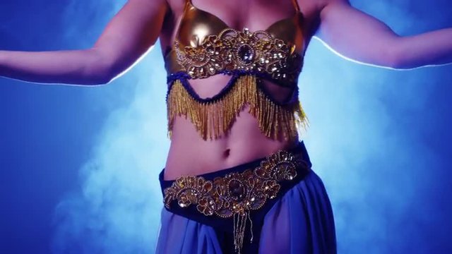 Closeup of belly dancer's torso