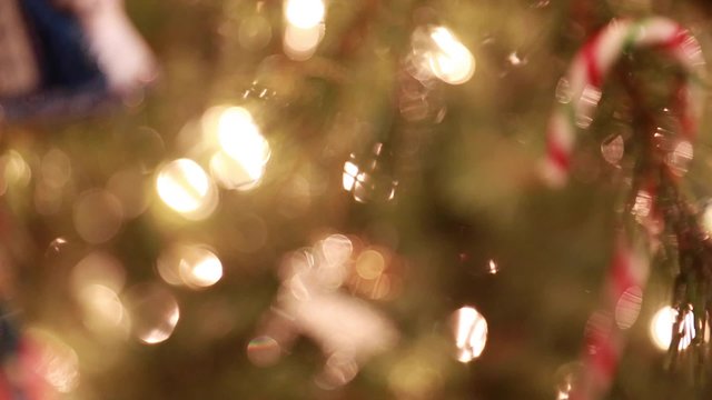 beautiful christmas tree ornaments on tree rack focus