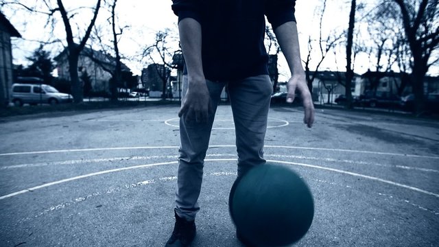 SLOW MOV: Tapping And Throwing Ball To Basket With Depressed Look
