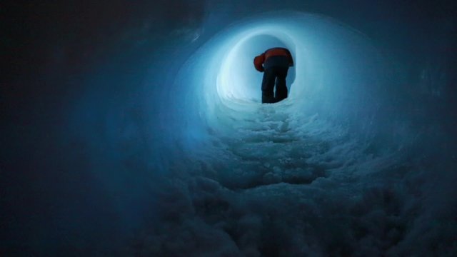 kid in ice tunnel