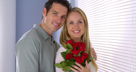 Beautiful couple with roses