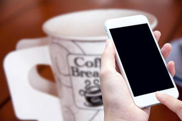 woman hand hold and touch screen smart phone
