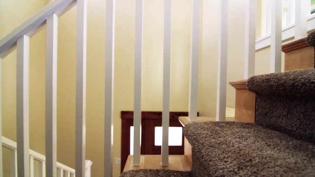 Dolly shot of stairs in a new home