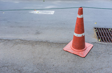traffic cone on bitumen pavement