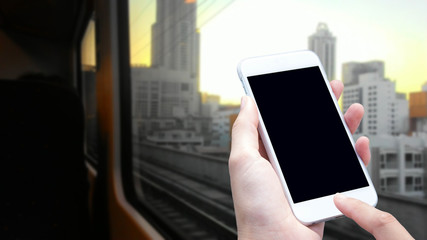 woman hand hold and touch screen smart phone