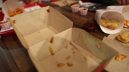 a family eating fast food at a restaurant