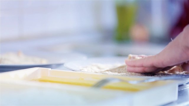 Soaking Meat in Different Ingredients To make Wiener Schnitzel