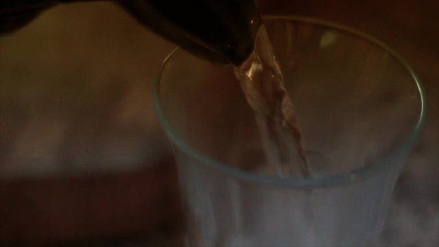 Slow Motion Pouring Water into Glass