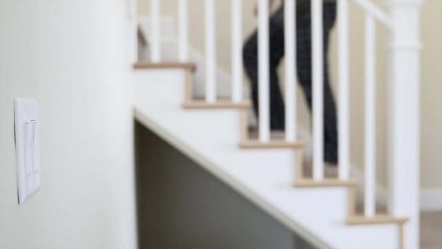 A man walks up the stairs