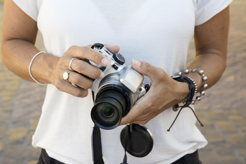 Fototapeta na wymiar camera woman, With bracelets on their hands