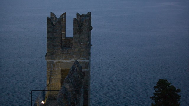 Castle fortress with calm sea in background