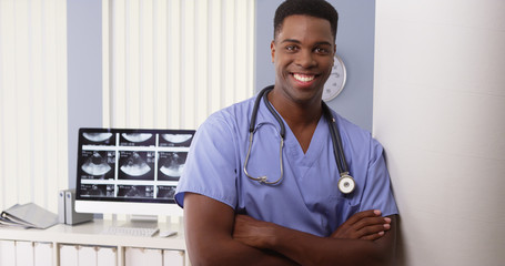 Portrait of black male medical doctor in hospital