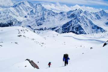 Fototapeta na wymiar Hiking in winter mountains