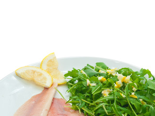 smoked trout fillets with arugula and lemon