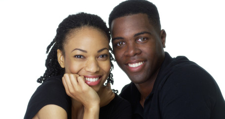 Happy Young Black couple looking at camera smiling
