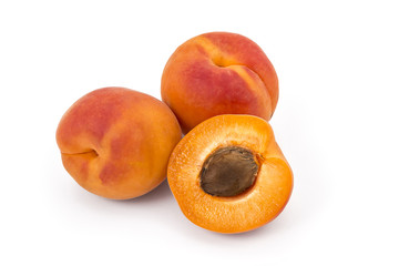 Naklejka na ściany i meble Fresh ripe organic apricots isolated on a white background