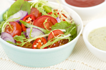Mixed Leaf & Vegetable Summer Salad - Salad with tomatoes, rocket, lettuce, red onions and peppers.