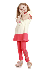 Beautiful blonde girl in a red pantsuit 