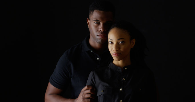 Dramatic Portrait Of Strong Young Black Couple