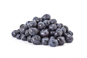 Pile of fresh ripe organic blueberries on a white background