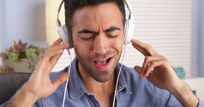 Mexican Guy Singing Along To Music With Headphones