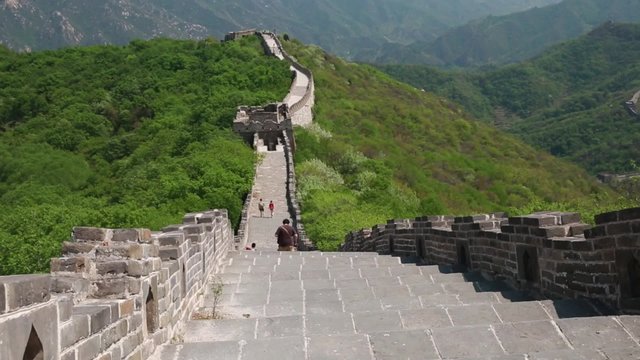 tourists hiking along the great wall of china jiankou section