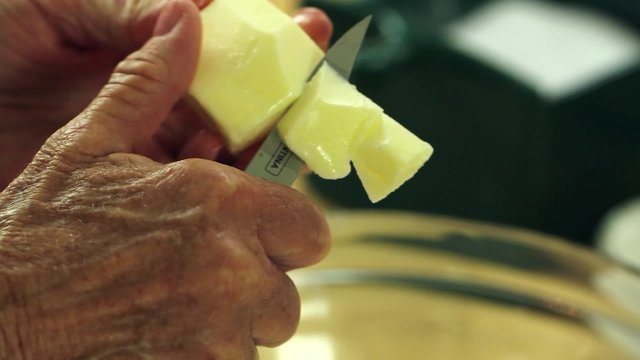 cutting butter for a pie crust