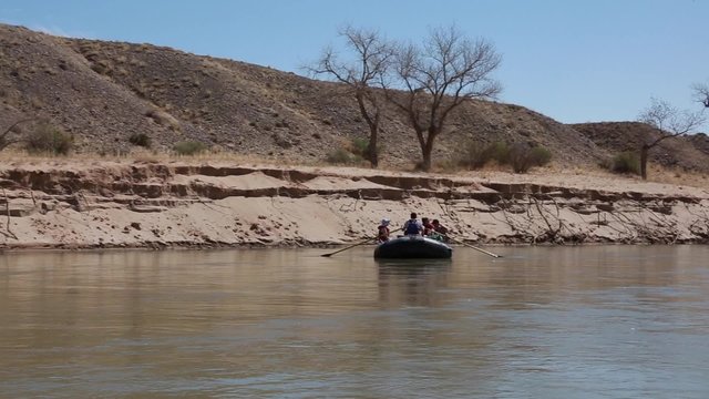 rowing a river raft on the san juan river on rafts
