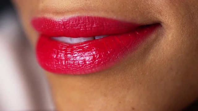 Closeup of woman puckering lips