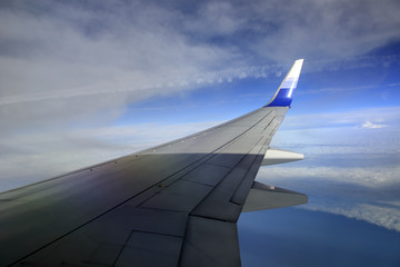 Fototapeta na wymiar View from airplane with wing