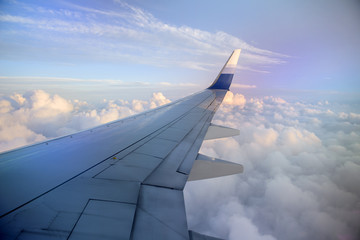 Naklejka na ściany i meble View from airplane with wing