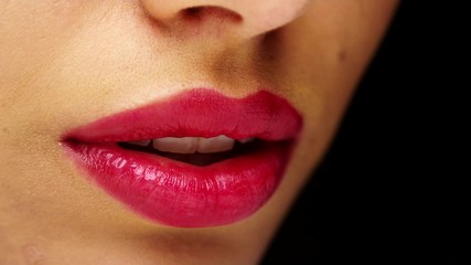 Hispanic woman's red luscious lips
