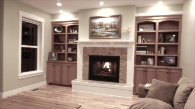 a roaring fireplace in sitting room jib shot