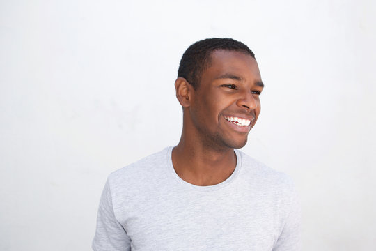 Young african american guy laughing