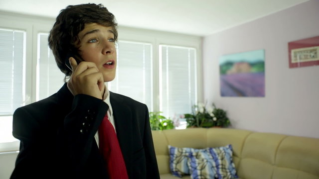 Business Boy On The Phone At Home