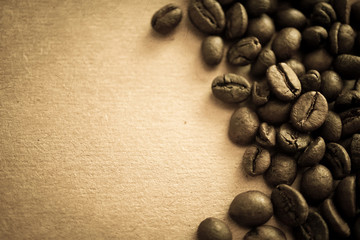 coffee beans on vintage color paper background
