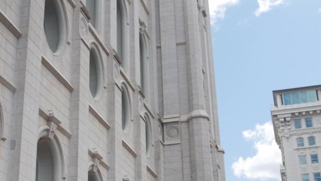 Young Family walking by Temple Square at Salt Lake City Utah