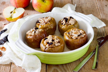 Delicious baked apple filled with minced meat, prunes, onions and walnuts