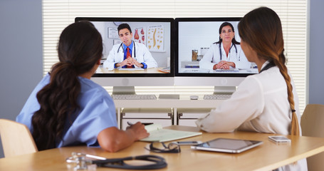 Team of diverse medical doctors having a video conference