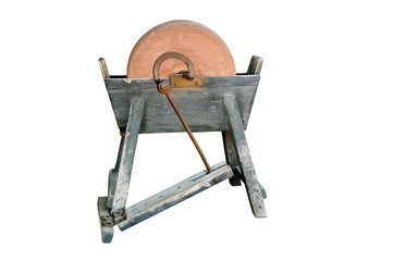 Ancient grindstone on a white background.