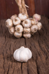 bunch of garlic on wooden table