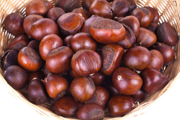 chestnuts sit on a white background