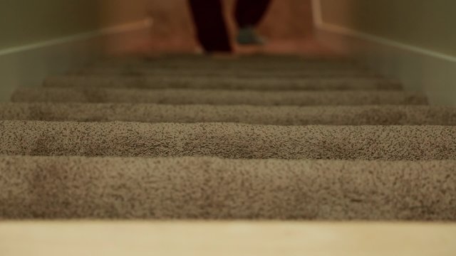 man walking down stairs