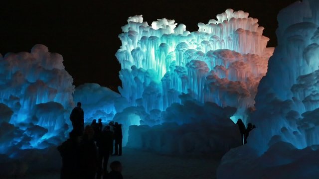 frozen ice castle and crowd