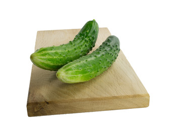 Sliced cucumber on cutting board close-up