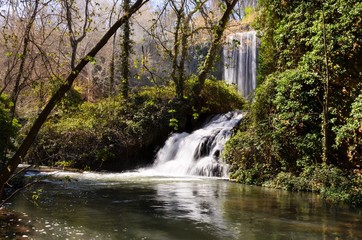 Fototapeta na wymiar Waterfall in the Natural Park 