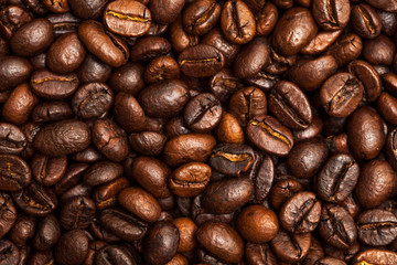 Roasted coffee beans close up. Top view.