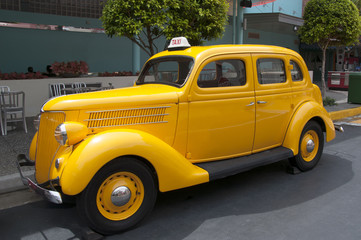 Fototapeta na wymiar vintage taxi yellow color